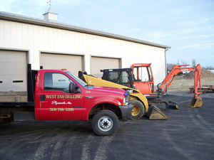 Photo of work truck and earth movers